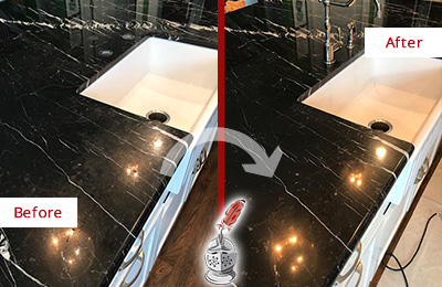 Before and After Picture of Black Marble Countertop Sealed to Reverse Water Damage